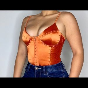 Orange bodysuit